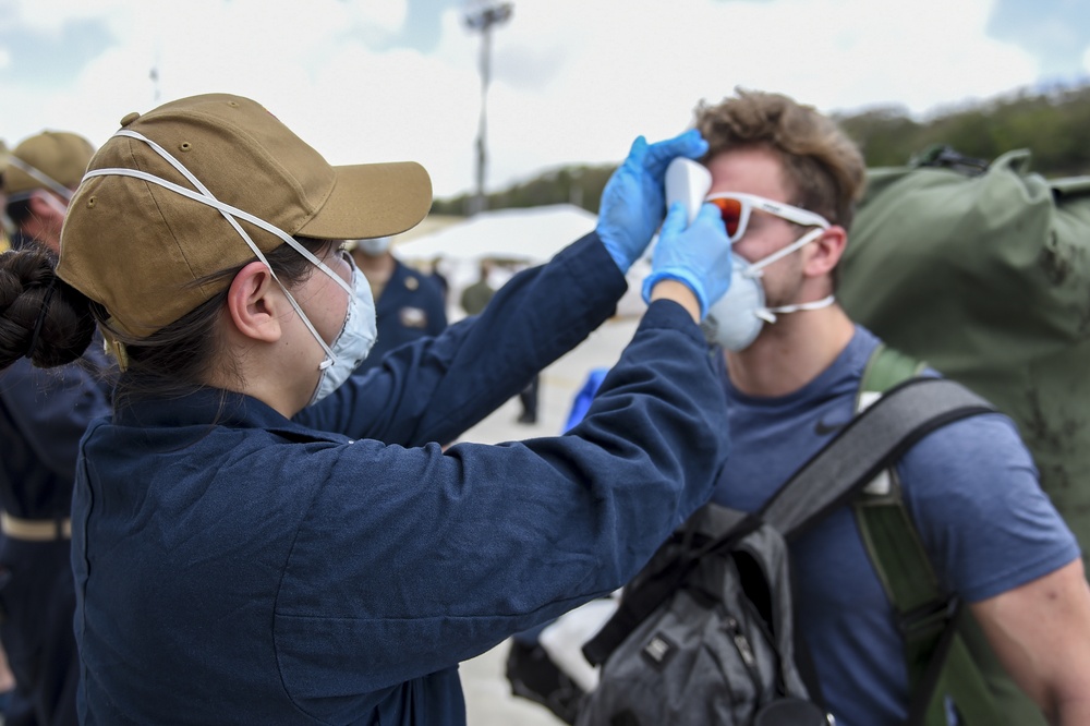 Sailors Return to USS Theodore Roosevelt After Completion of Quarantine