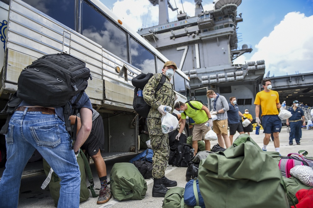 Sailors Return to USS Theodore Roosevelt After Completion of Quarantine