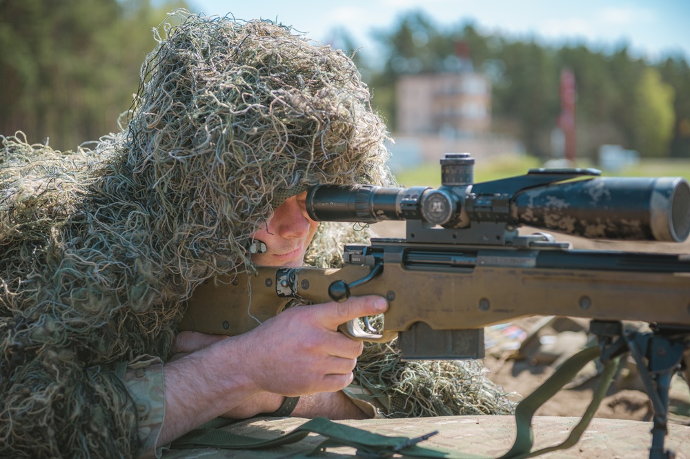 British snipers sharpen their skills during NATO's eFP BG-P