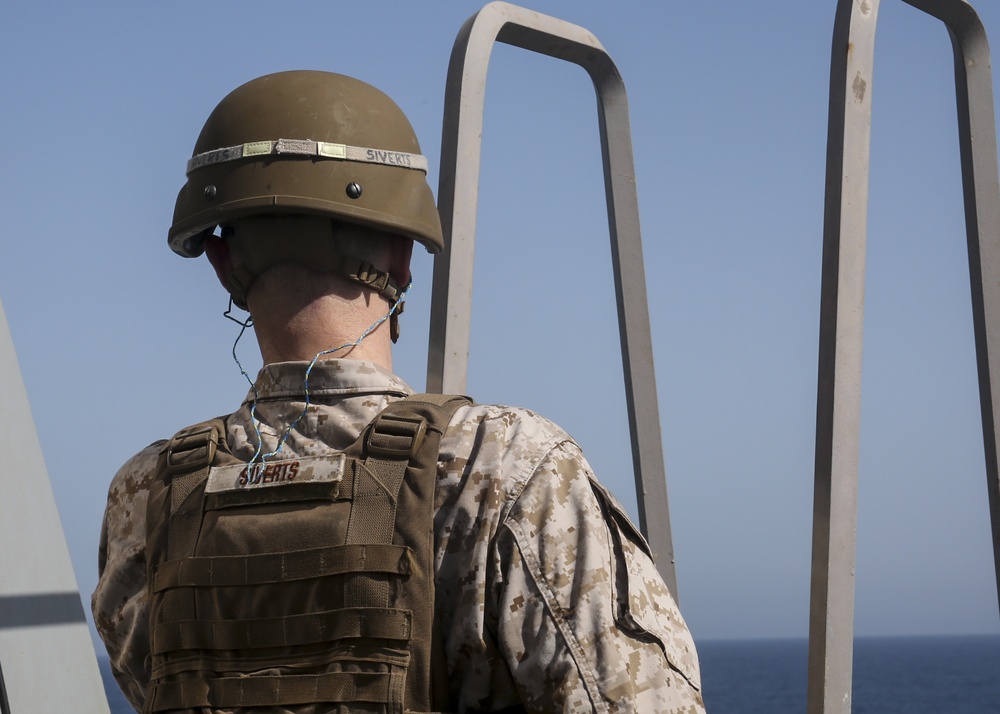 Marines fire .50-caliber machine guns aboard USS New York