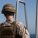 Marines fire .50-caliber machine guns aboard USS New York