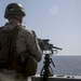 Marines fire .50-caliber machine guns aboard USS New York