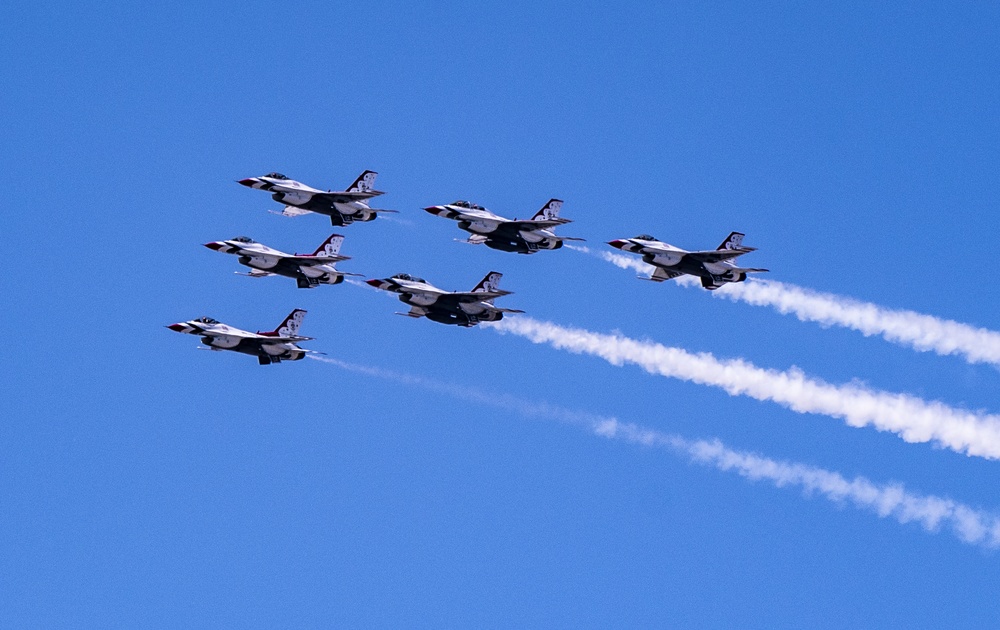 The U.S. Air Force Air Demonstration Squadron, the Thunderbirds in flight formation for the America Strong formation