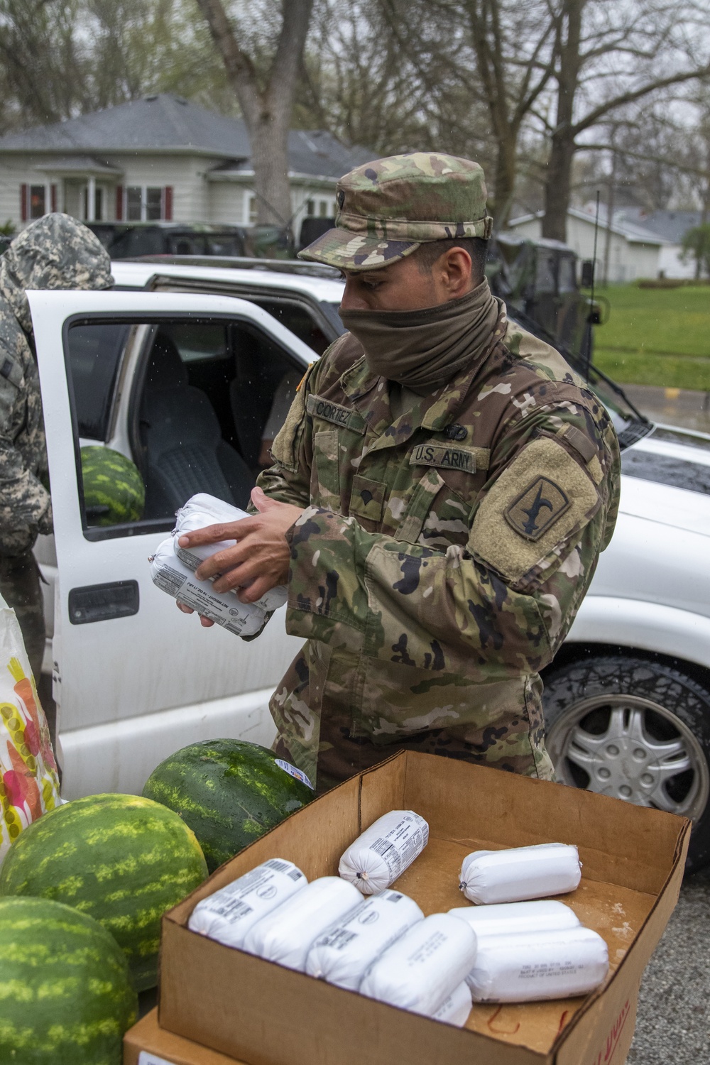 Nebraska Soldiers help distribute food in Tecumseh