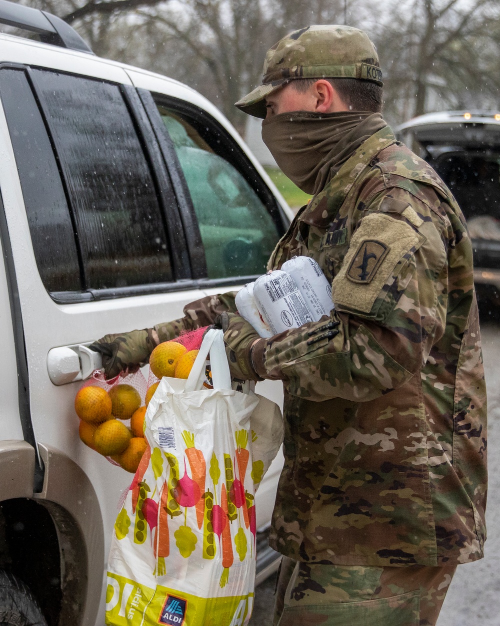 Nebraska Soldiers help distribute food in Tecumseh