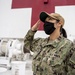 USNS Mercy Sailor Renders Hand Salute