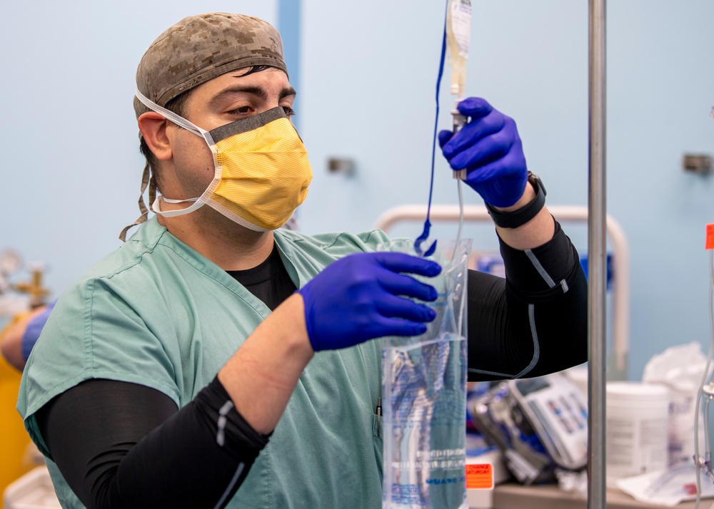 USNS Mercy Sailor Treats Patient