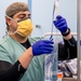 USNS Mercy Sailor Treats Patient