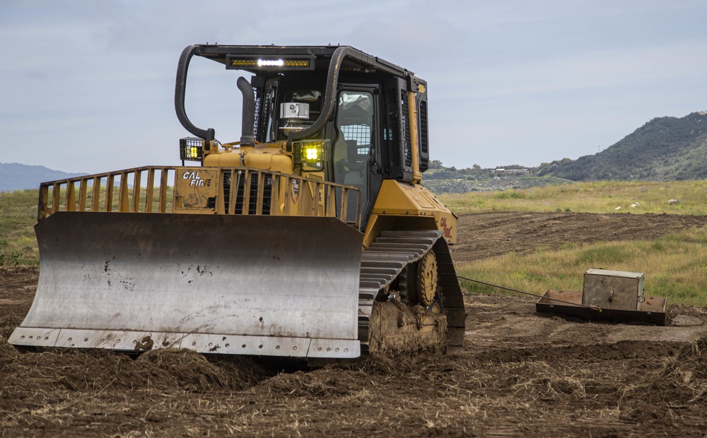 Heavy equipment training helps prepare Camp Pendleton, California fire fighters