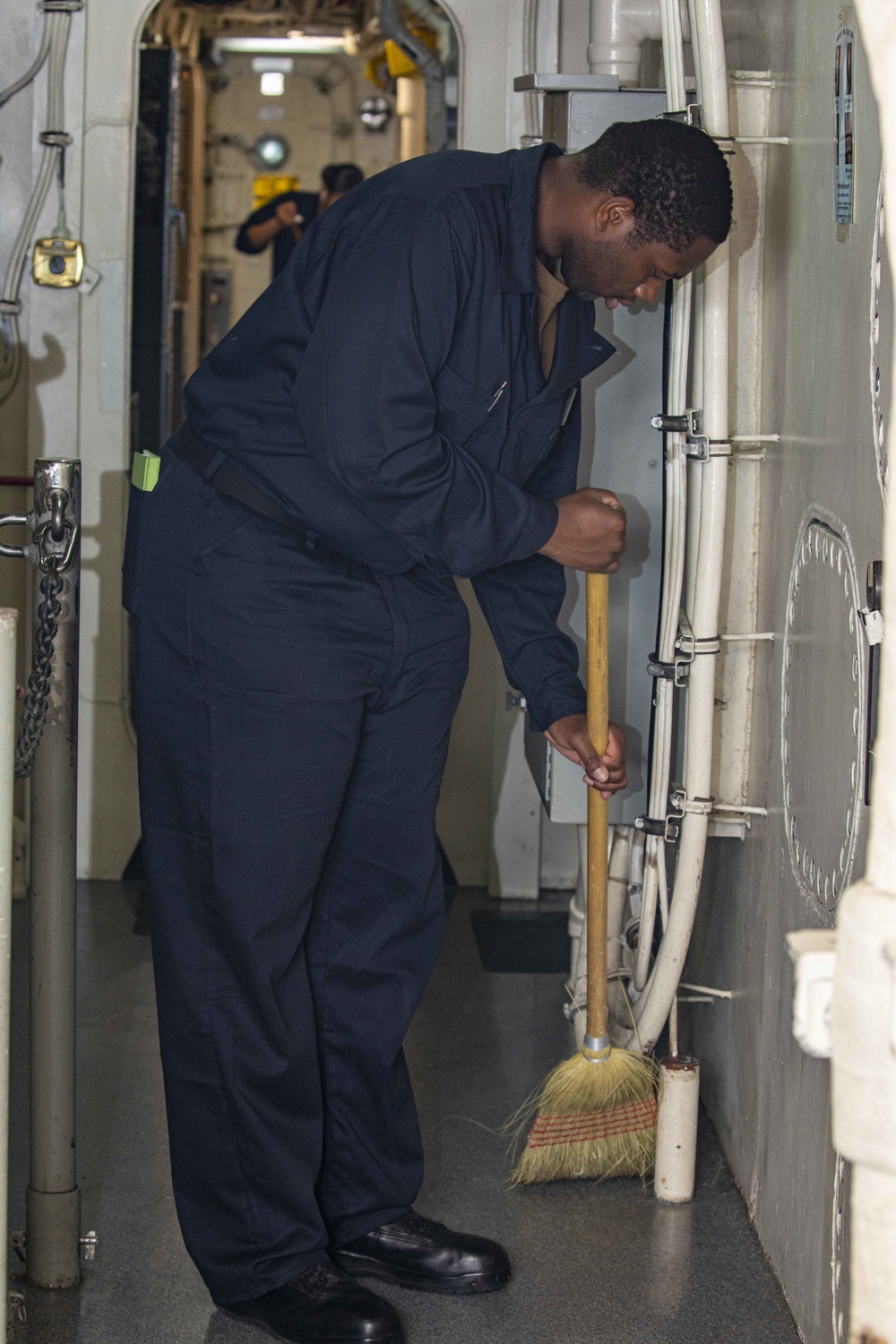 Sailors take part in cleaning station