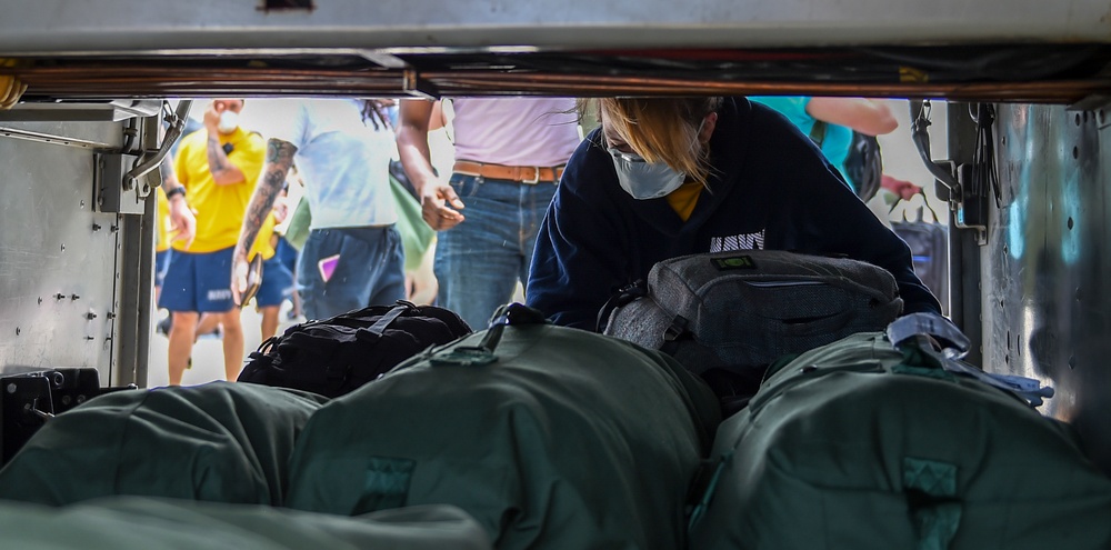 USS Theodore Roosevelt Sailors Return to Ship After Quarantine