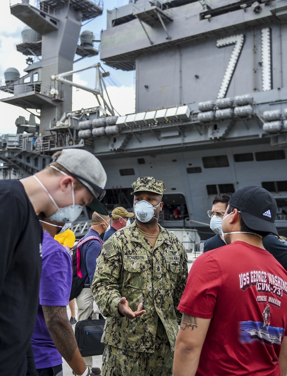 Sailors Return to USS Theodore Roosevelt After Completion of Quarantine