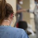 3rd Medical Battalion Sailors conduct daily medical checks with USS Theodore Roosevelt Sailors