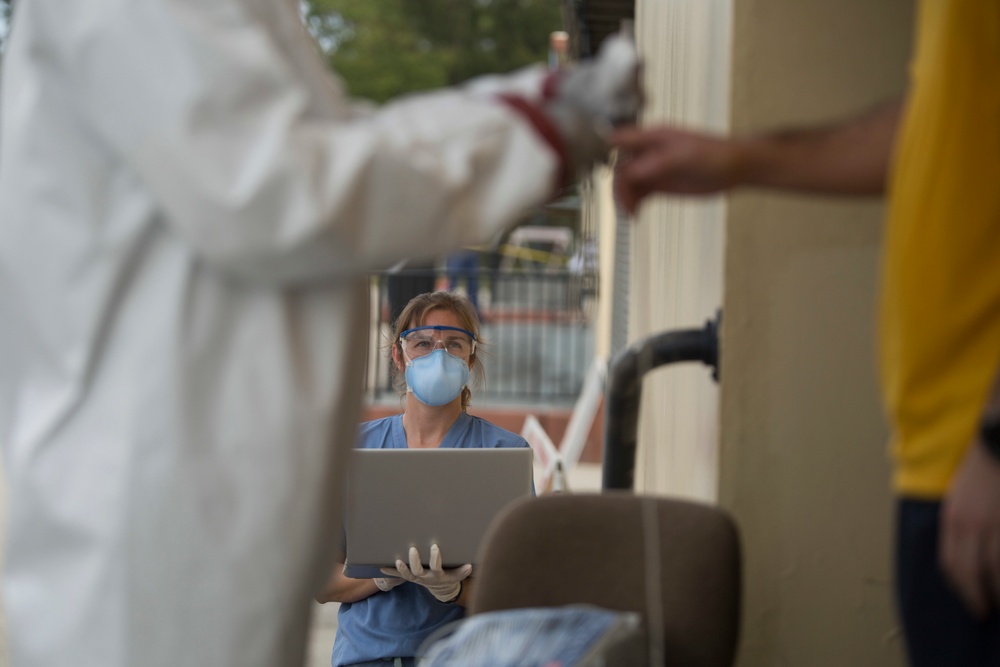 3rd Medical Battalion Sailors conduct daily medical checks with USS Theodore Roosevelt Sailors
