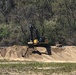 Medvolt Construction moving dirt on Kansas Dept. of Corrections Levee