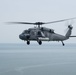 An MH-60S Sea Hawk demonstrates ALMDS equipment