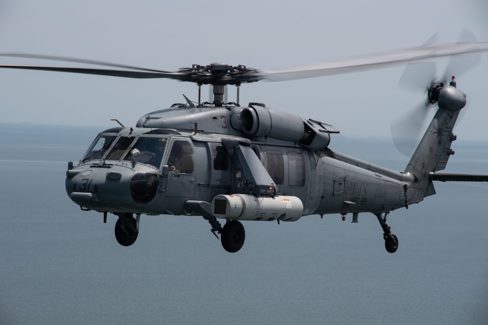 An MH-60S Sea Hawk demonstrates ALMDS equipment