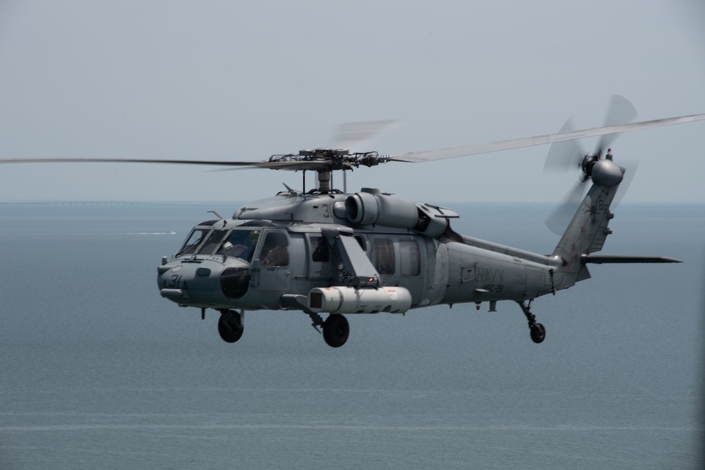 An MH-60S Sea Hawk demonstrates ALMDS equipment