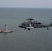 An MH-60S Sea Hawk demonstrates ALMDS equipment