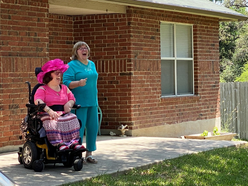 Healthcare workers deliver birthday cheer to cancer survivor