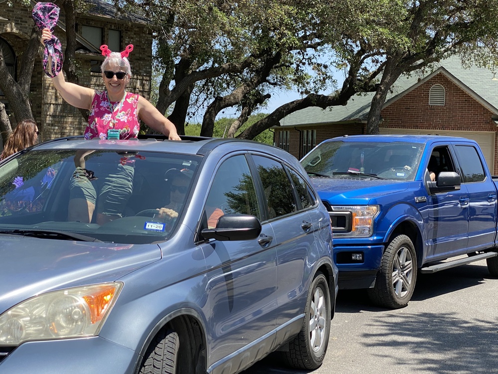 Healthcare workers deliver birthday cheer to cancer survivor