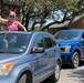 Healthcare workers deliver birthday cheer to cancer survivor