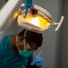 USNS Mercy Sailor Performs Dental Assessment