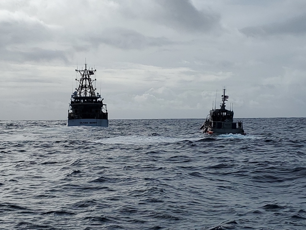 USCGC Oliver Berry joint training with US Air Force