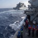 USS Mustin Conducts Replenishment At Sea