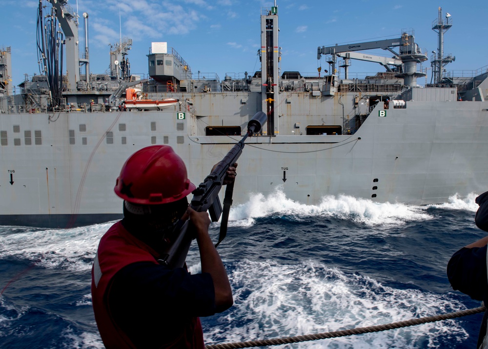 USS Mustin Conducts Replenishment At Sea