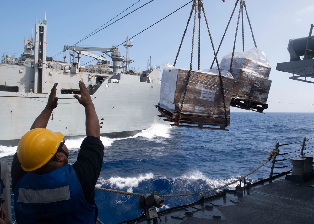 USS Mustin Conducts Replenishment At Sea