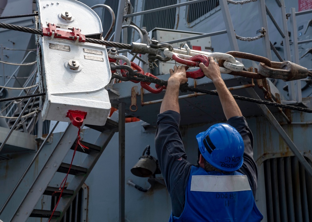 USS Mustin Conducts Replenishment At Sea