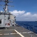 USS Mustin Conducts Replenishment At Sea