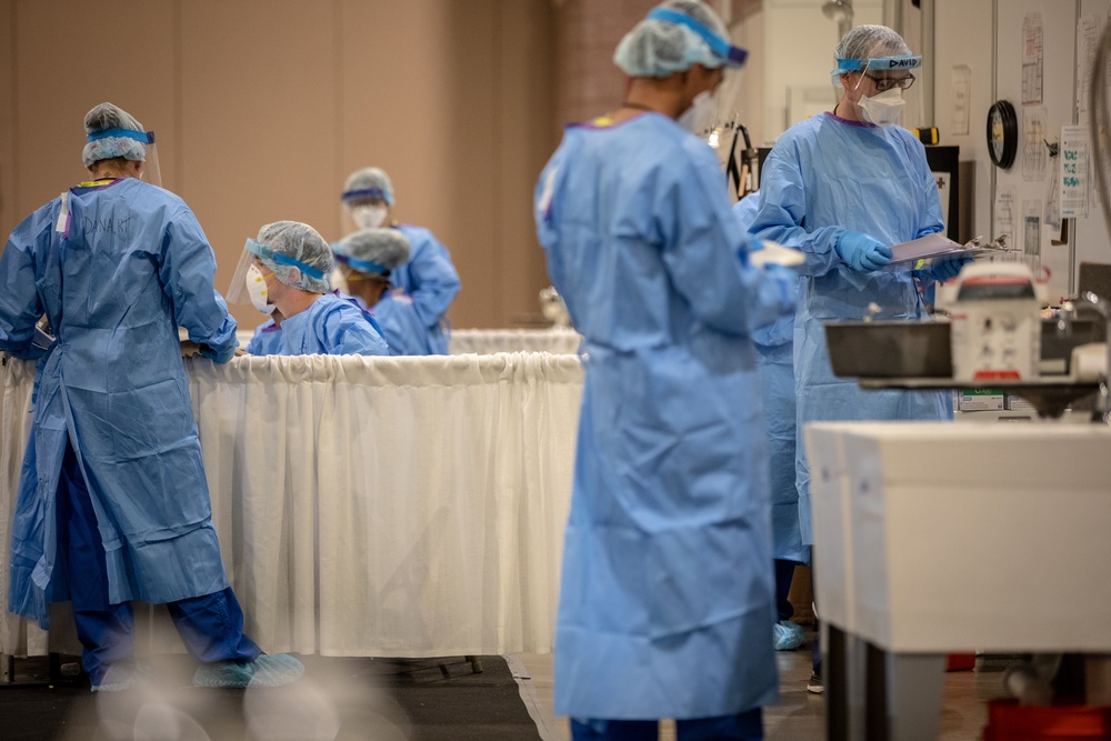 Soldiers at the Atlantic City Field Medical Station provide aid to patients
