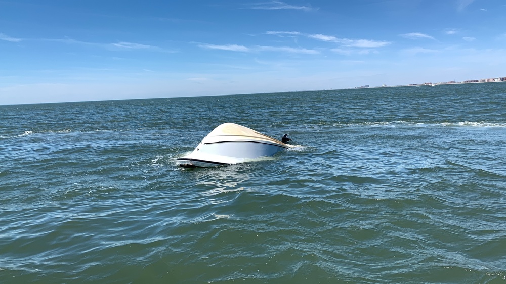 Motor vessel overturns near Point Lookout
