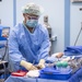 USNS Mercy Sailor Preps Surgical Tool Station