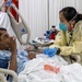 USNS Mercy Sailor Treats Patient