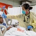 USNS Mercy Sailor Treats Patient