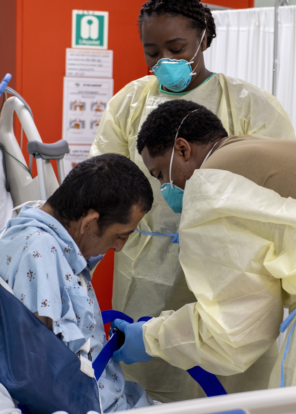 USNS Mercy Sailors Prep Patient for Physical Therapy