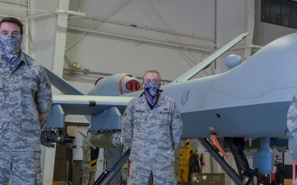 9th AMU pose and MQ-9 Reaper