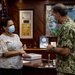 U.S. Pacific Fleet Commander Presents Guam Governor with the Navy Distinguished Public Service Award.