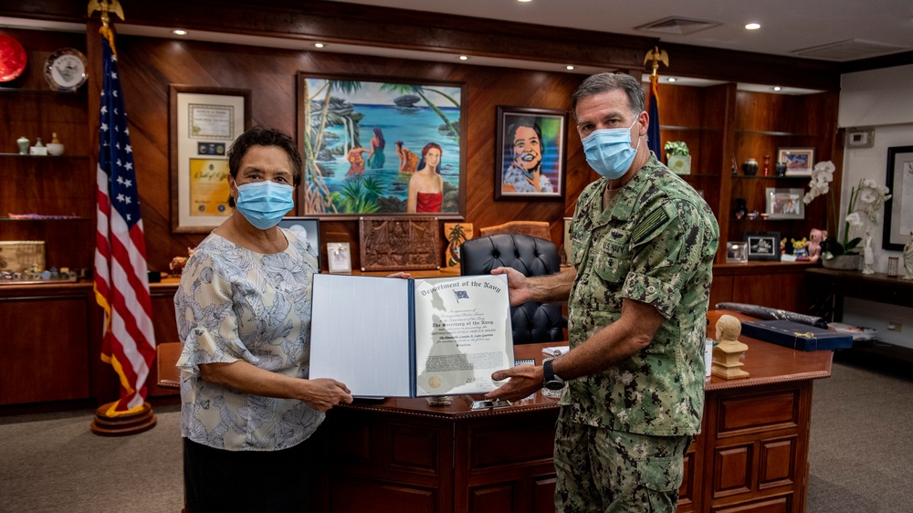 U.S. Pacific Fleet Commander Presents Guam Governor with the Navy Distinguished Public Service Award.