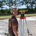 U.S. Navy Seabees from NMCB 5’s Detail Diego Garcia place concrete in support of the U.S. Air Force
