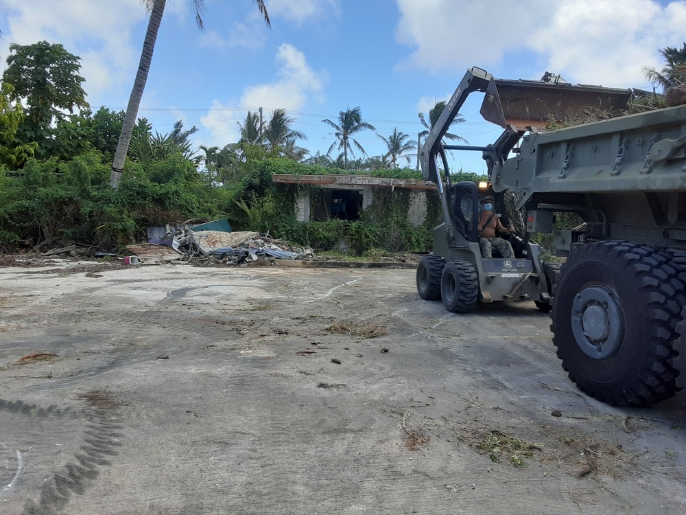 U.S. Navy Seabees with NMCB-5’s Detail Tinian support the locals through various projects