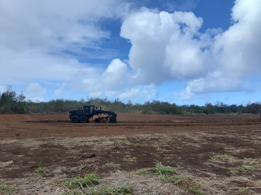 U.S. Navy Seabees with NMCB-5’s Detail Tinian support the locals through various projects