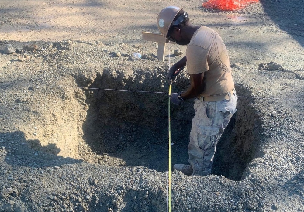 U.S. Navy Seabees with NMCB-5’s Detail Timor-Leste construct a two-room schoolhouse