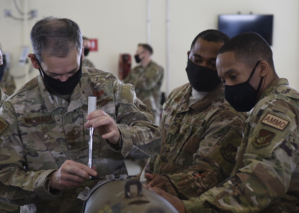 7th AF commander receives mission update from the Wolf Pack