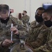 7th AF commander receives mission update from the Wolf Pack