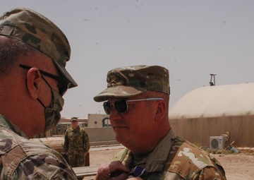 Purple Heart medals presented to Soldiers of the 34th Expeditionary Combat Aviation Brigade