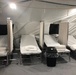 Patient Beds in a Surplus Military Tent